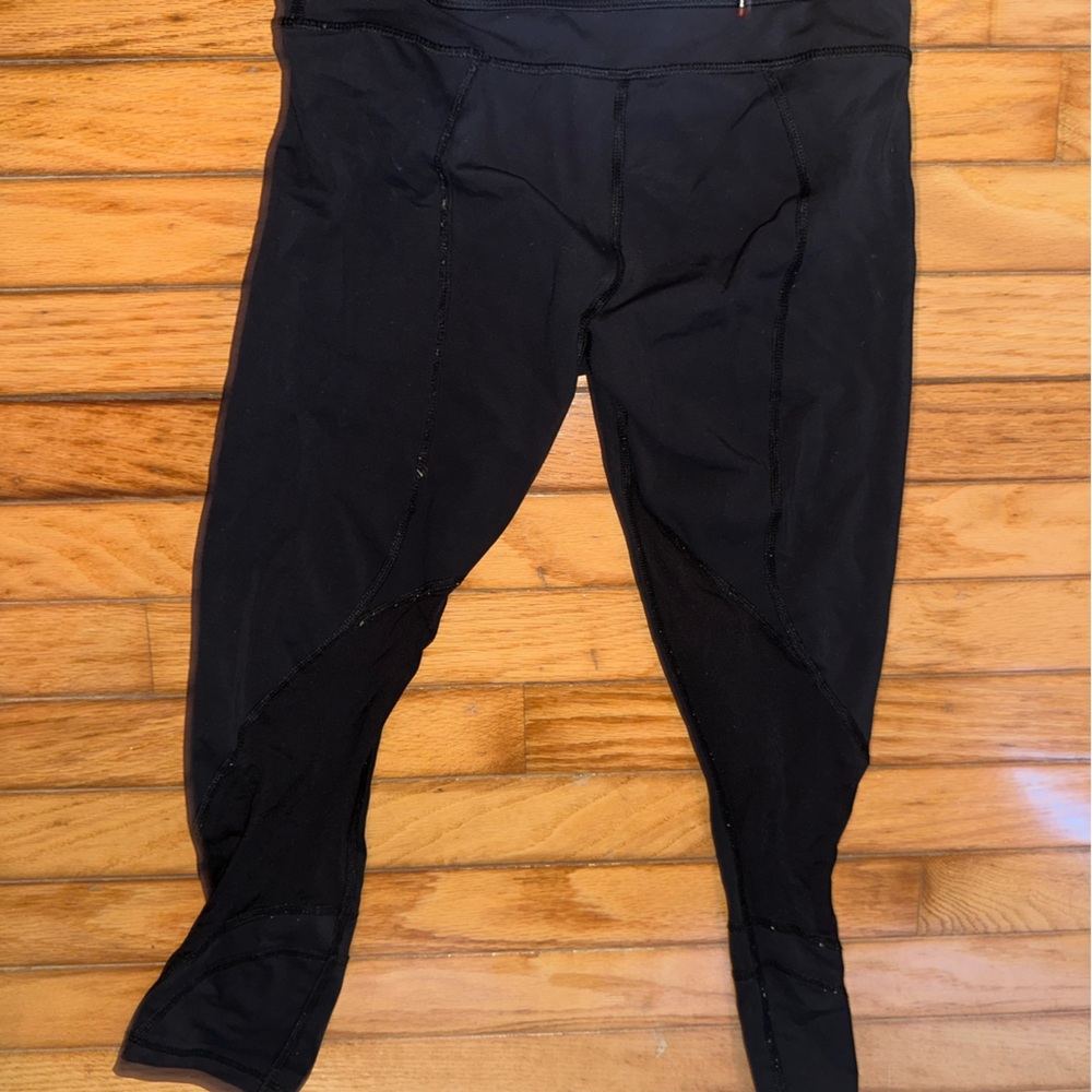 LULULEMON workout pants sheer siding size 4